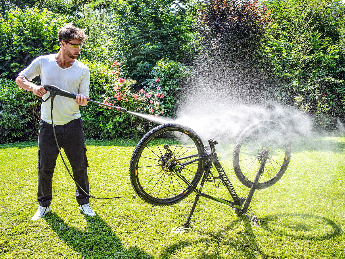 clean your bike using a high pressure cleaner